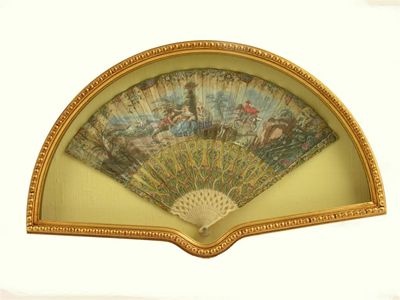 Appraisal: A fan c with pierced and painted ivory sticks with