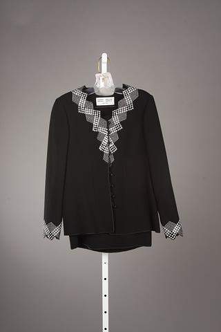 Appraisal: Aurora Ruffolo Christian Ruperto black skirt suit with beaded jacket