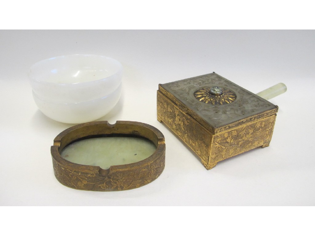 Appraisal: Gilded metal and jade ashtray a box and two stone