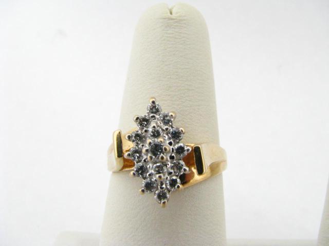 Appraisal: Lady's K yellow gold diamond cluster ring approximately fifteen diamonds