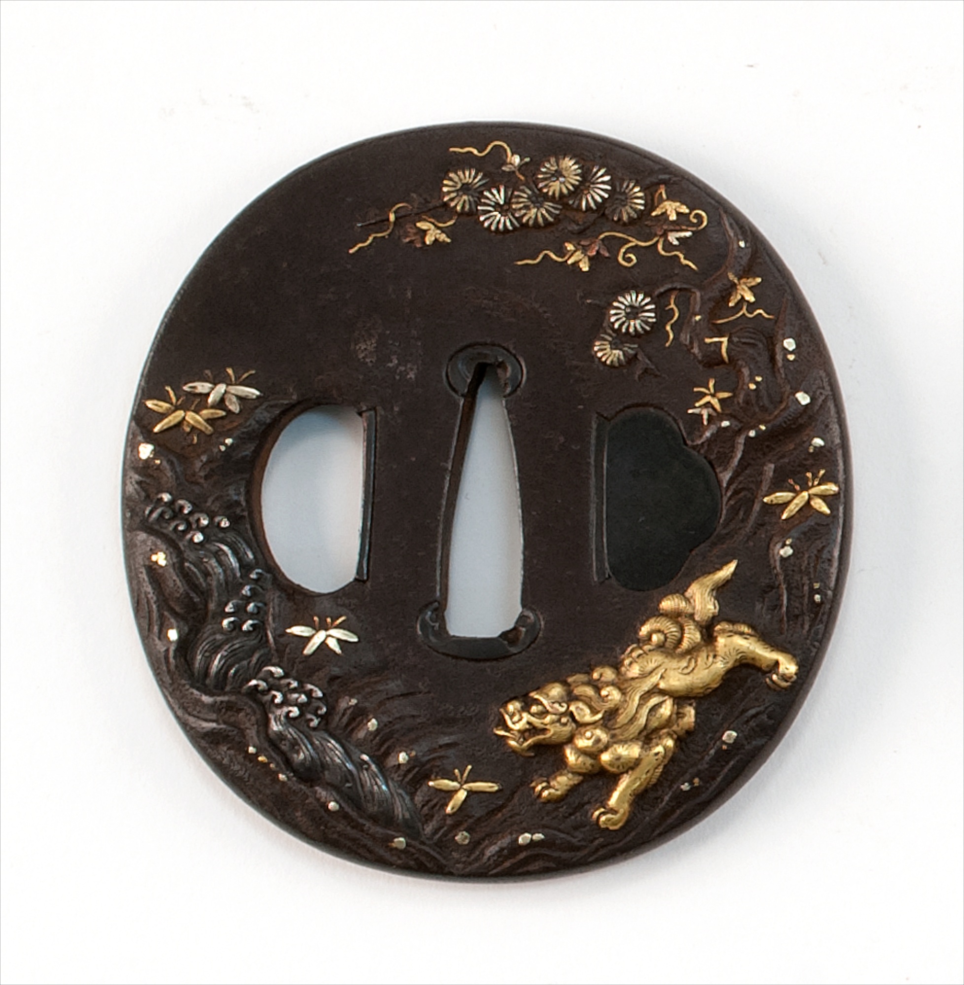 Appraisal: INLAID IRON SHIN NO MARU-GATA TSUBA th CenturyWith high-relief depiction