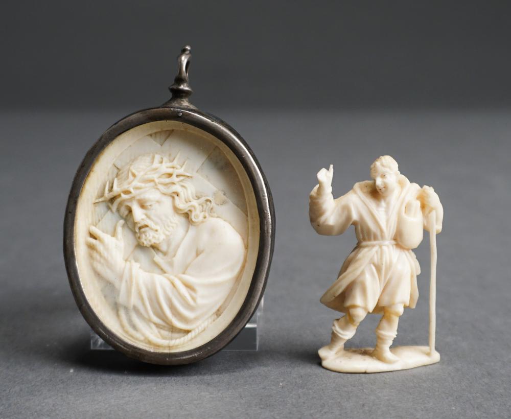 Appraisal: Continental Carved Double-Side Pendant and Figure of Man