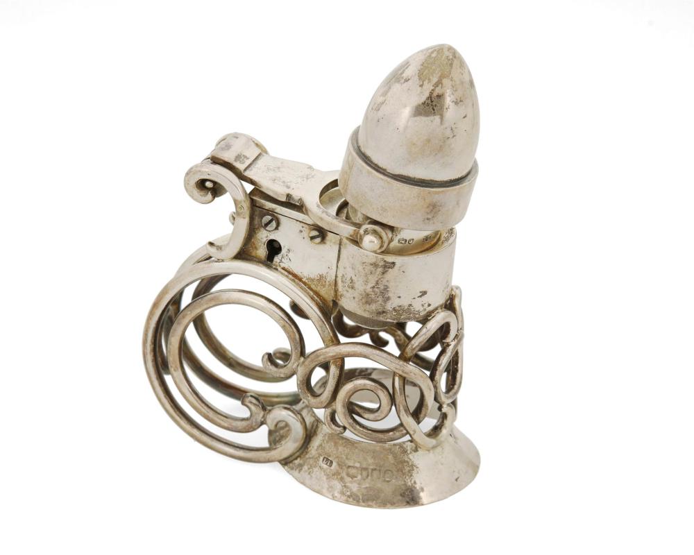 Appraisal: A LOUIS DEE STERLING SILVER CLARET JUG TOPPERA Louis Dee