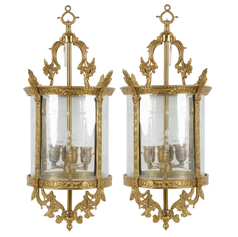 Appraisal: PAIR OF GILT METAL ETCHED GLASS LANTERNSeach with four curved