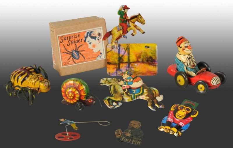 Appraisal: Lot of Assorted Tin Toys Description All toys are working