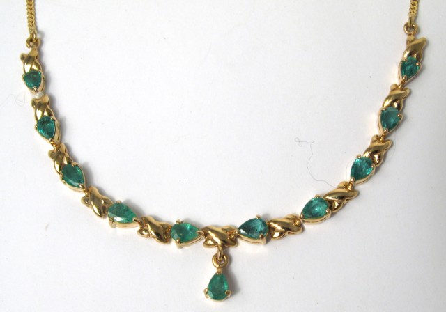 Appraisal: EMERALD AND EIGHTEEN KARAT GOLD NECKLACE - in length and