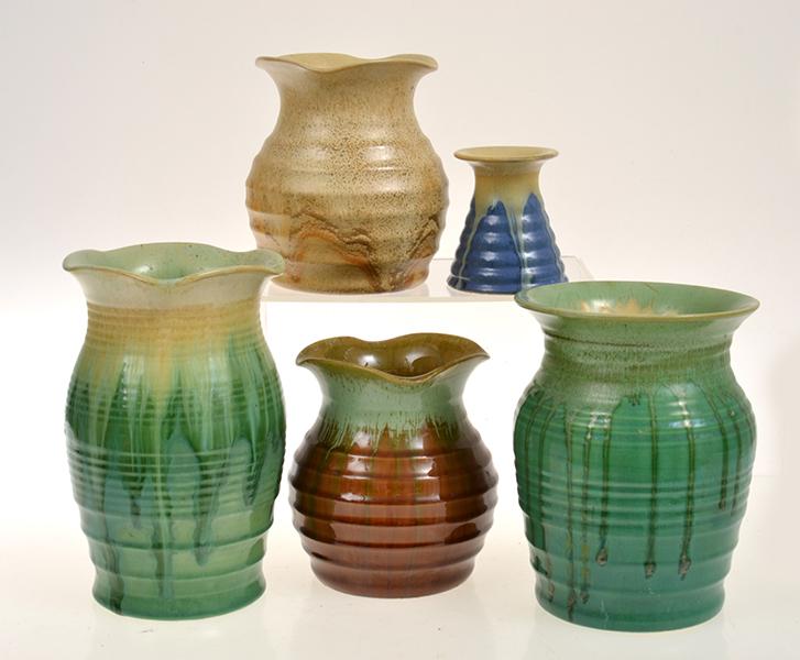 Appraisal: FIVE REMUED POTTERY VASES MOST RIBBED WITH FLARED RIMS ONE