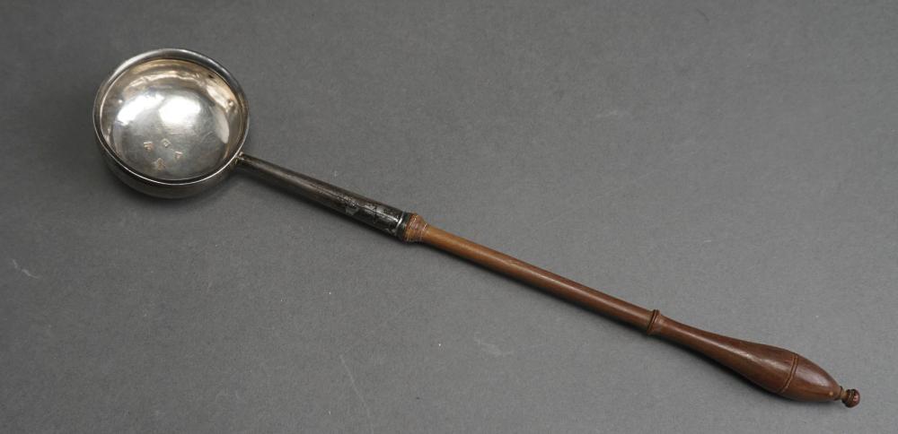 Appraisal: GEORGE II STERLING SILVER WALNUT HANDLE TODDY LADLE STARLING WILFORD