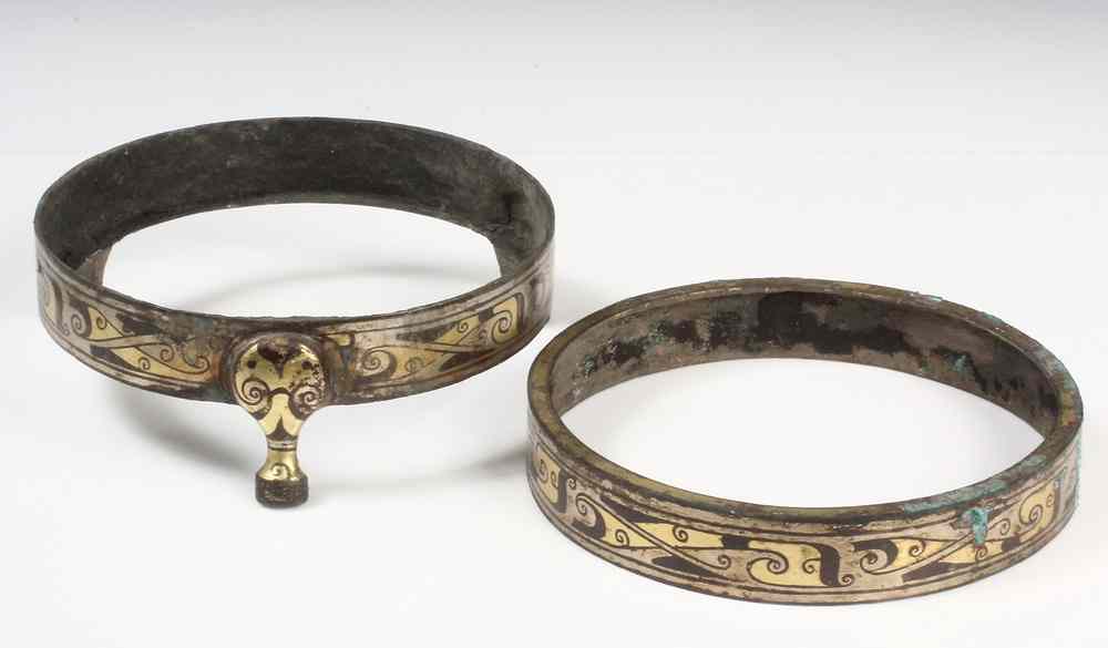 Appraisal: CHINESE HAN DYNASTY METALWORK- base and rim fittings in bronze