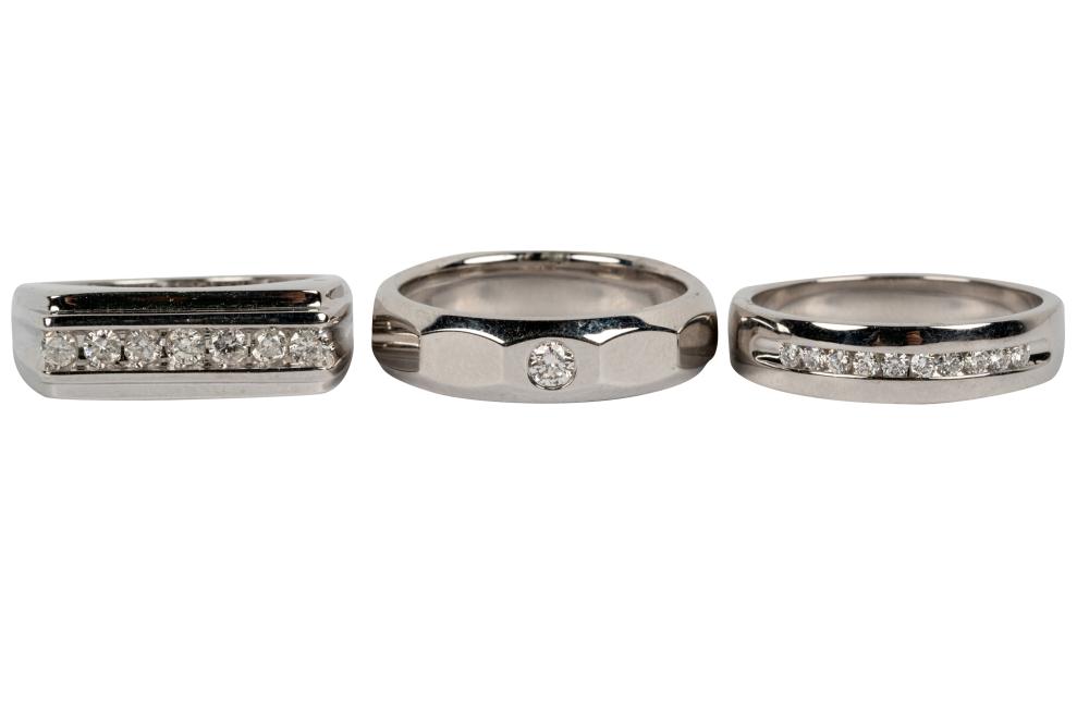 Appraisal: THREE KARAT WHITE GOLD DIAMOND BAND RINGSone ring containing seven