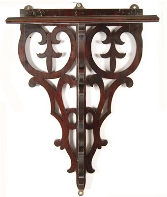 Appraisal: A George III mahogany bracket with pierced supports and a