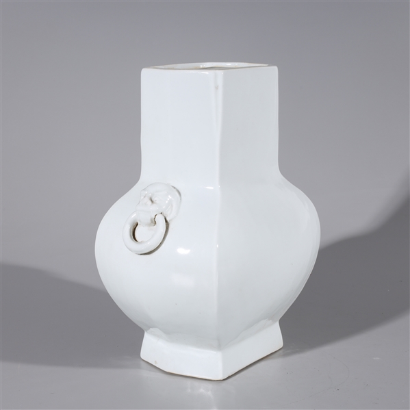 Appraisal: White Chinese white glaze porcelain vase with molded foo lion