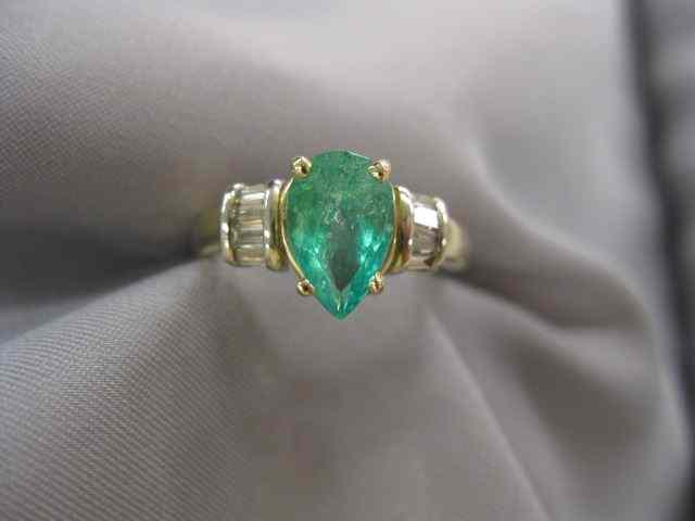 Appraisal: Emerald Diamond Ring pear shape gem weighing carat and baguette