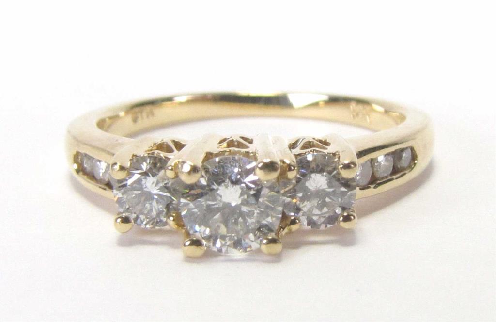 Appraisal: Very nice K yellow gold three-stone style ring center diamond