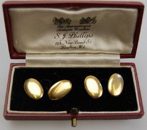 Appraisal: Pair of ct oval hollow yellow gold chain link cufflinks