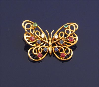 Appraisal: A gold butterfly brooch set with diamonds sapphires rubies and