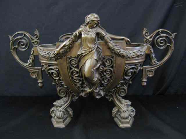 Appraisal: Art Nouveau Bronze Centerpiecewith women garland rococo design footed handled