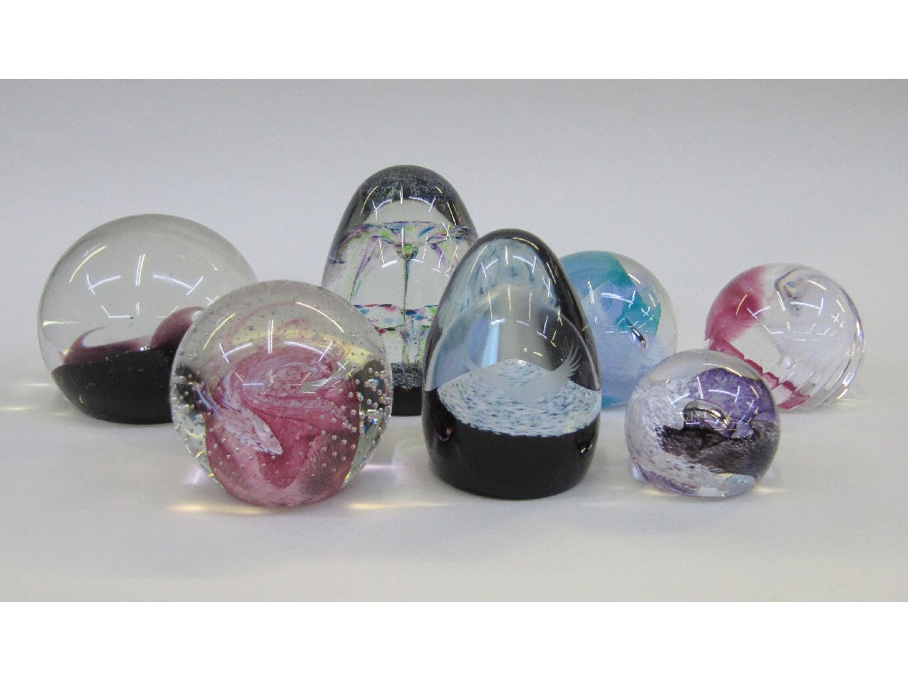 Appraisal: Seven Caithness glass paperweights to include Misty Moon Crystal Cauldron