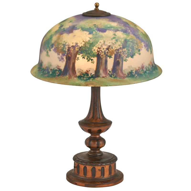 Appraisal: PAIRPOINT REVERSE PAINTED TABLE LAMP Glass shade with landscape design