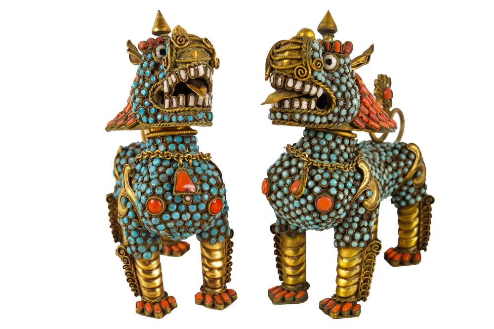 Appraisal: PAIR OF CHINESE STONE-INLAID GILT METAL DRAGONSwith removable heads Condition