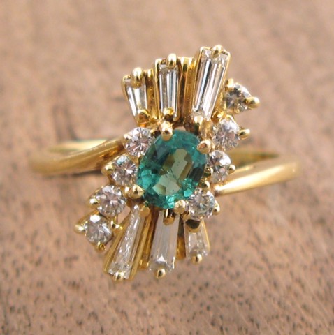 Appraisal: EMERALD DIAMOND AND YELLOW GOLD RING The k yellow gold