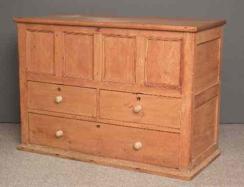 Appraisal: An th Century stripped panelled pine mule chest with plain