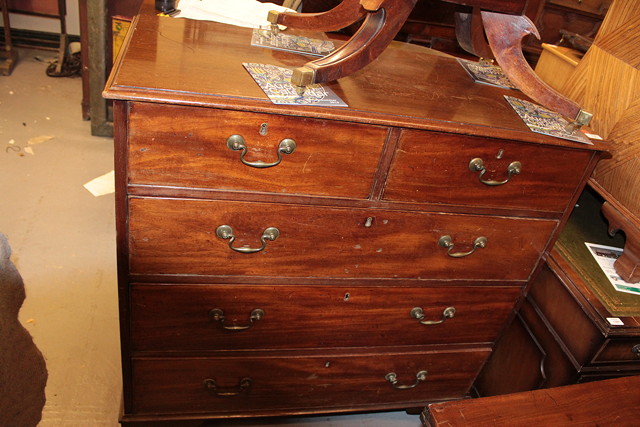 Appraisal: A GEORGIAN MAHOGANY CHEST of two short and three long