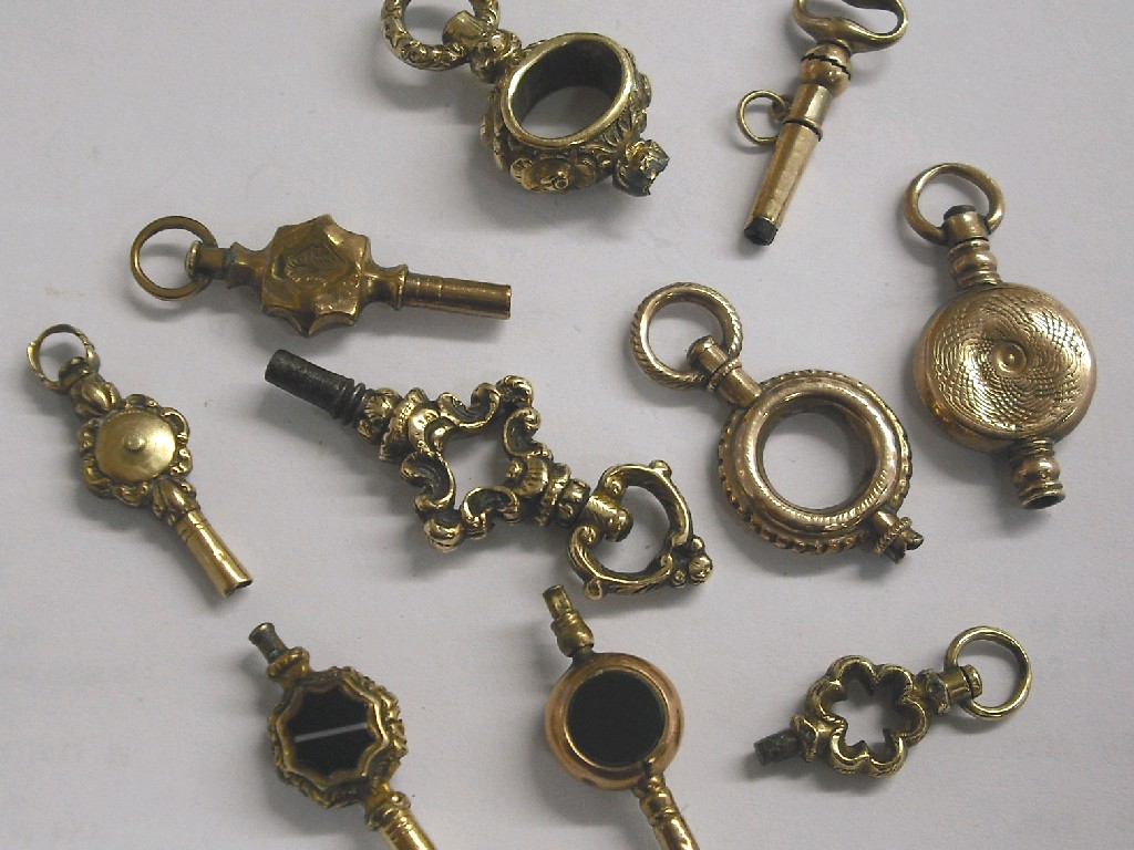 Appraisal: Selection of ornate gilt gold pocket watch keys some at