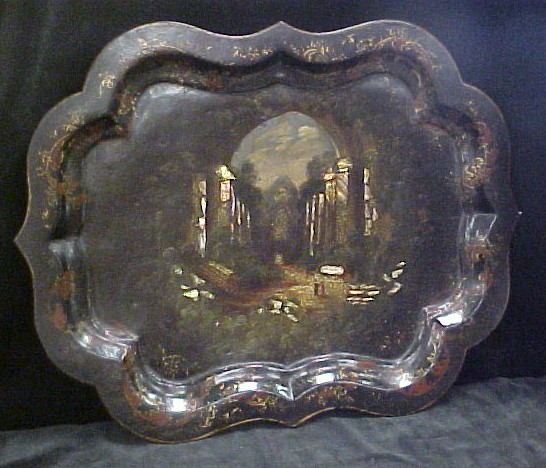 Appraisal: Shaped rim papier mache tray scene with arches abalone inlay