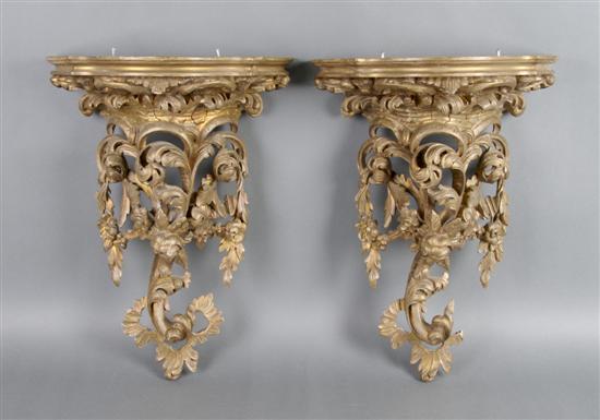 Appraisal: A Pair of Rococo Style Giltwood Brackets Height inches