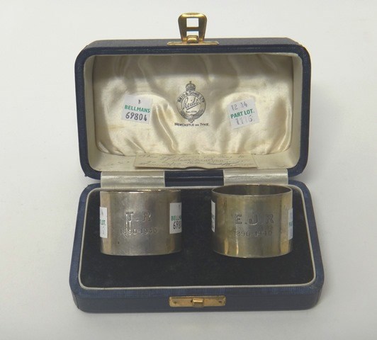 Appraisal: A pair of silver napkin rings each initial and date