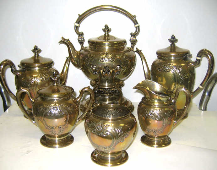 Appraisal: SIX-PIECE SILVER TEA COFFEE SET AND TRAY Each footed ovoid