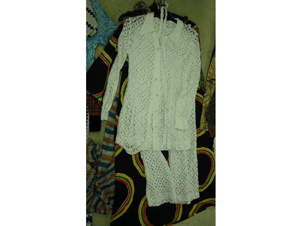 Appraisal: White lace pant suit black cotton dress decorated with coloured