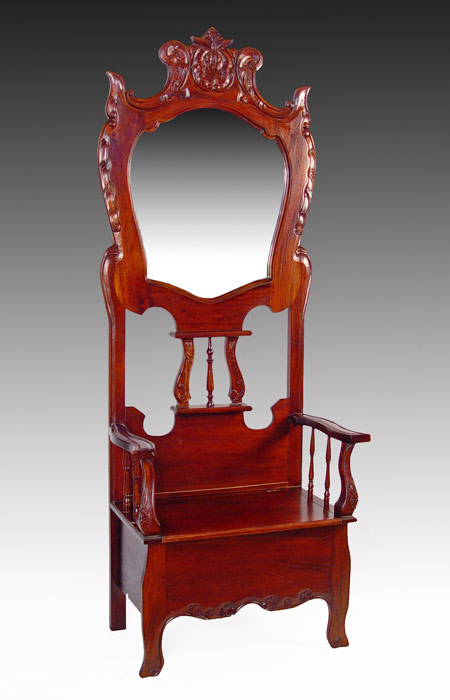 Appraisal: CARVED MAHOGANY HALL TREE BENCH Shaped and beveled mirror over