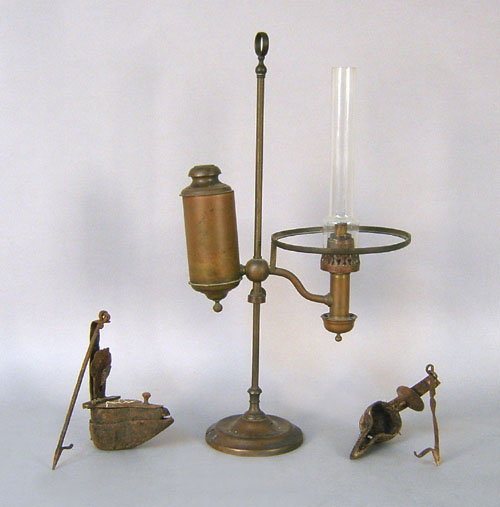 Appraisal: Brass student lamp h together with two iron betty lamps