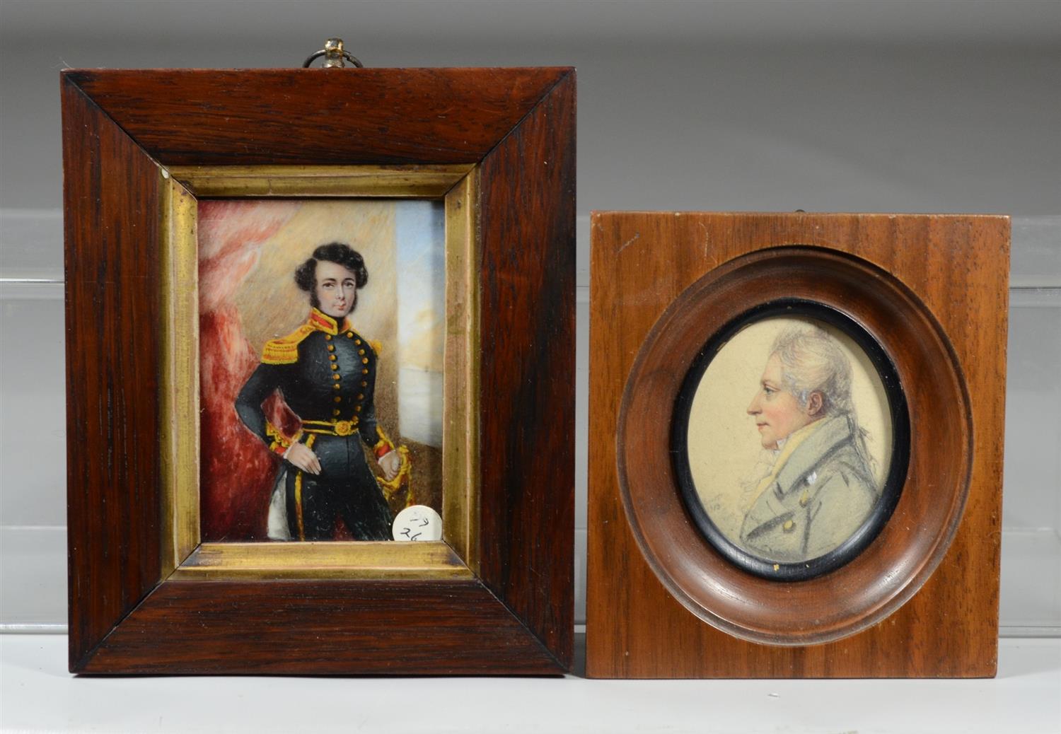 Appraisal: th c hand painted portraits on ivory in wood frames