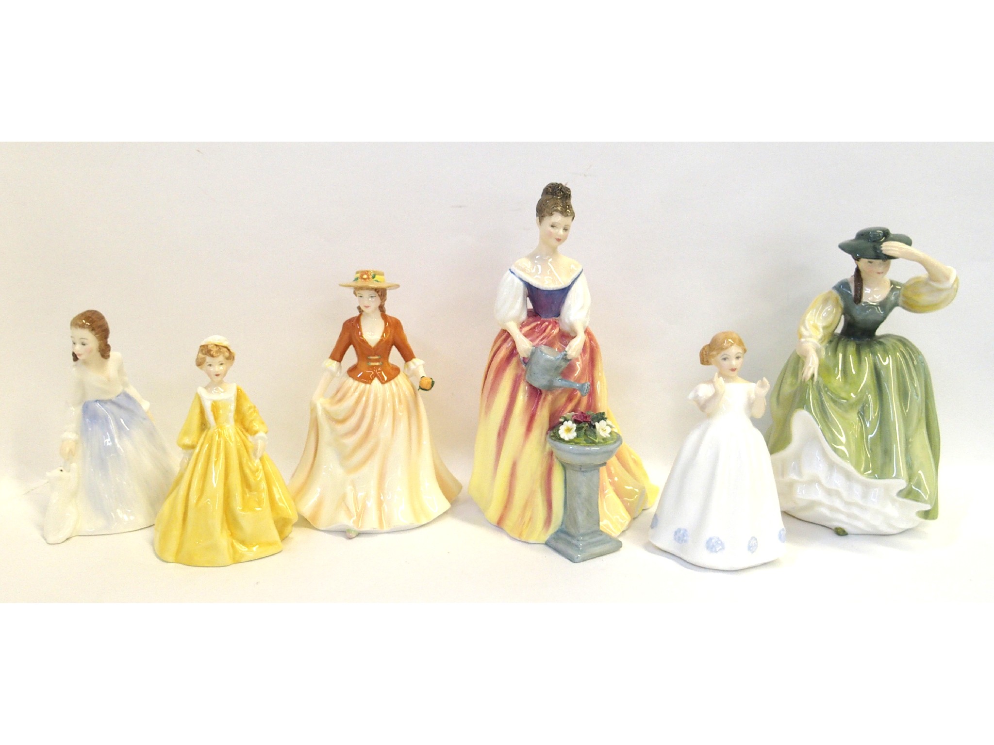 Appraisal: Five Royal Doulton figures including Alexandra HN Autumn Stroll HN