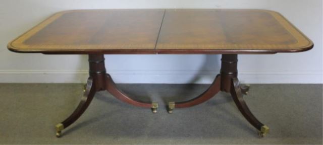 Appraisal: BAKER Mahogany Banded Dining Table with StringInlay and Leaves From