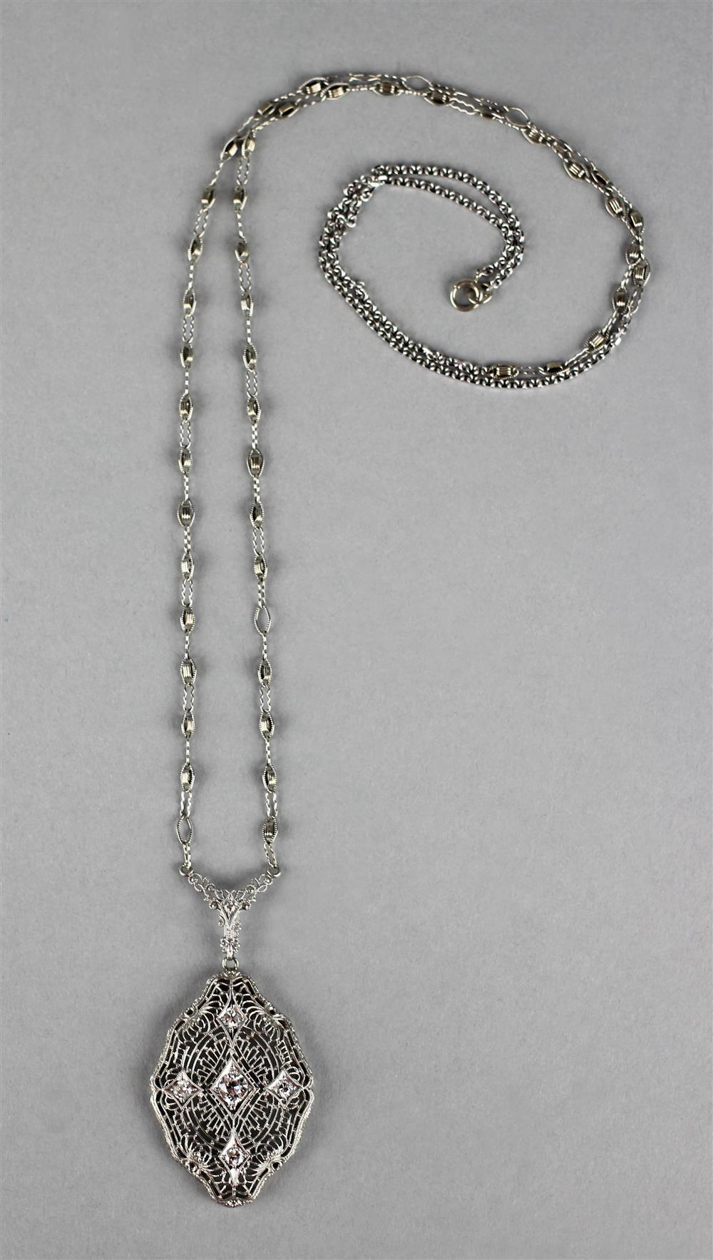 Appraisal: EDWARDIAN PLATINUM GOLD AND DIAMOND LAVALIERE marked Esemco and plat