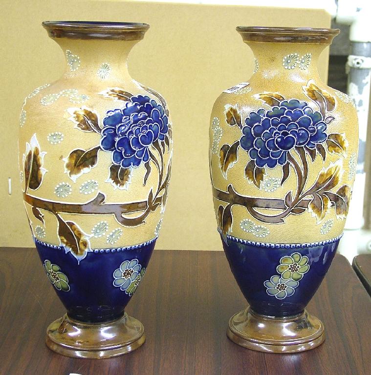 Appraisal: Pair of Doulton Slaters stoneware baluster vases tube line decoration