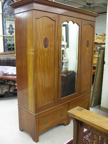 Appraisal: AN EDWARDIAN INLAID MAHOGANY WARDROBE English early th century The