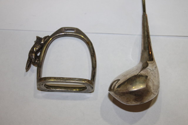 Appraisal: A MINIATURE SILVER STIRRUP surmounted by a fox Birmingham together