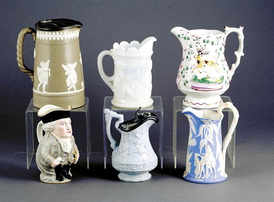 Appraisal: Collection of pitchers two Jasperware pitchers H and Toby style