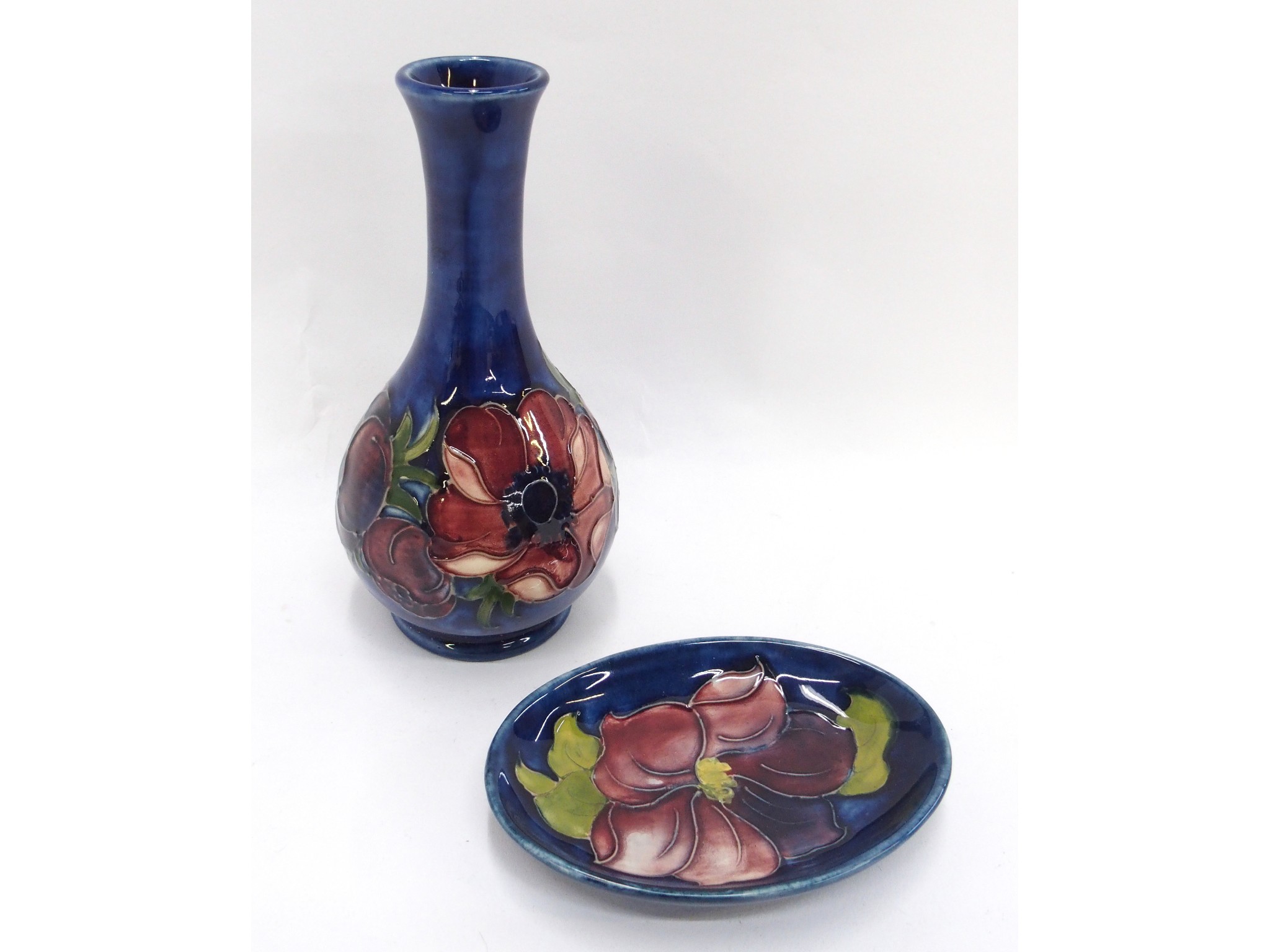 Appraisal: Moorcroft bud vase and Moorcroft pin dish