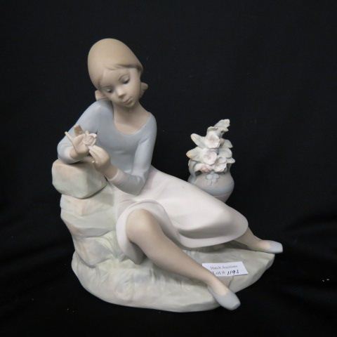 Appraisal: Lladro Porcelain Figurine of Seated Girl withFlower He Loves Me-He