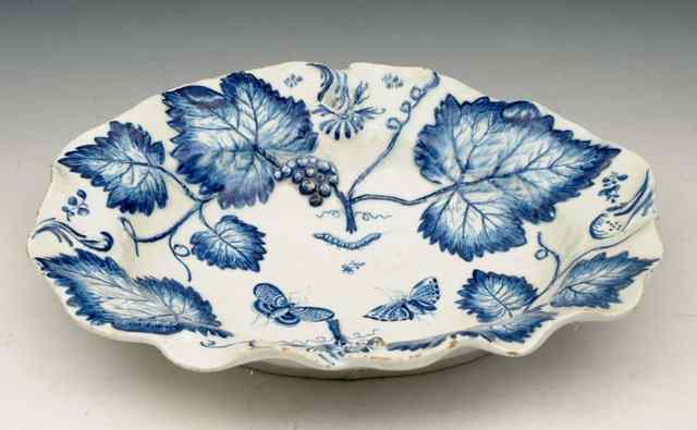 Appraisal: A BOW DESSERT DISH circa moulded with leaves and painted