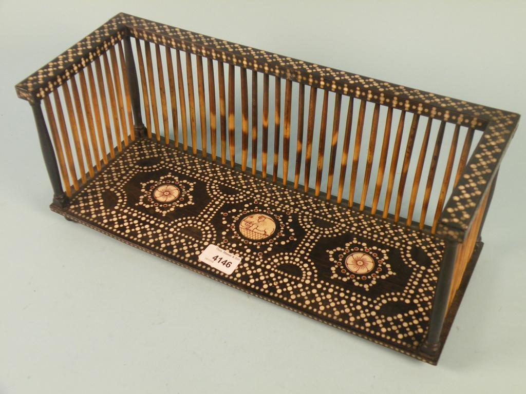 Appraisal: An Indian ivory and porcupine quill book rack decorated with