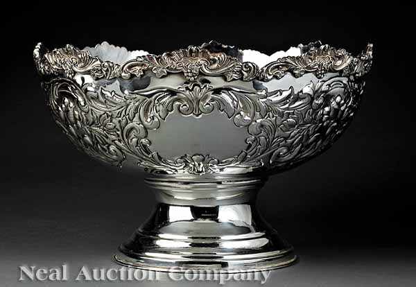 Appraisal: A Decorative Silverplate Punch Bowl marked Royal Castle Sheffield serpentine