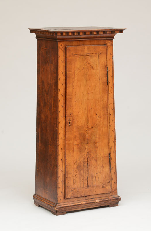 Appraisal: SOUTH GERMAN NEOCLASSICAL INLAID WALNUT PEDESTAL CABINET The overhanging top