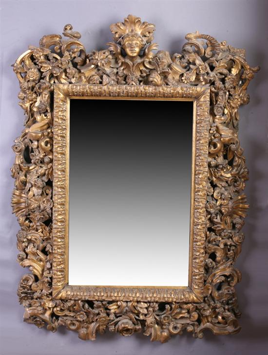 Appraisal: ITALIAN ROCOCO GILTWOOD PALACE WALL MIRROR th century with later